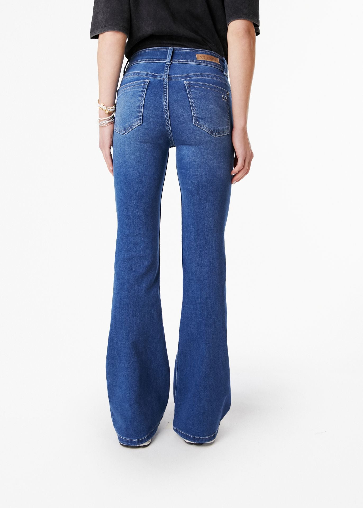 JEANS CELESTE FLARE RELOJERO C/ TAPETA AZUL EFESIS