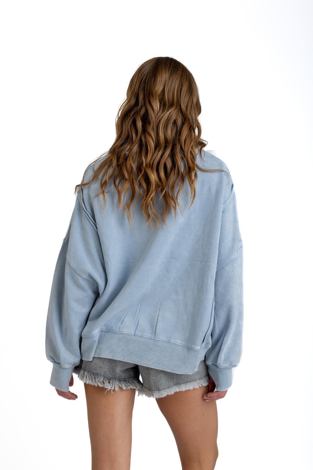 POLERON KIOTO OVERSIZE CORTES Y ESTAMPADO CELESTE EFESIS